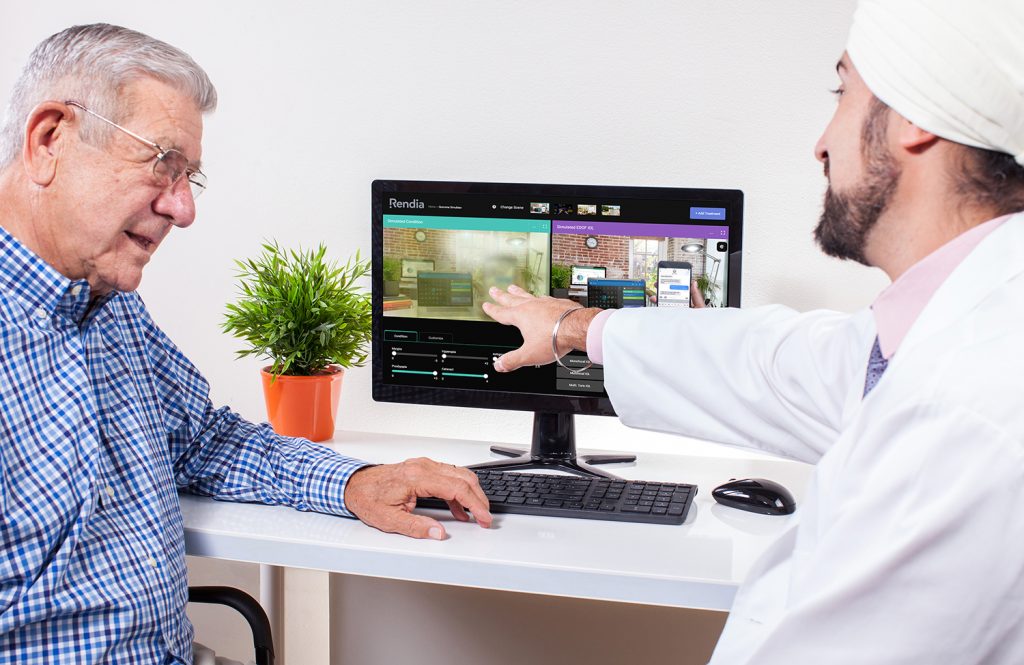 Cataract surgeon speaks with patient and uses the Outcome Simulator tool to show how the treatment will affect his vision