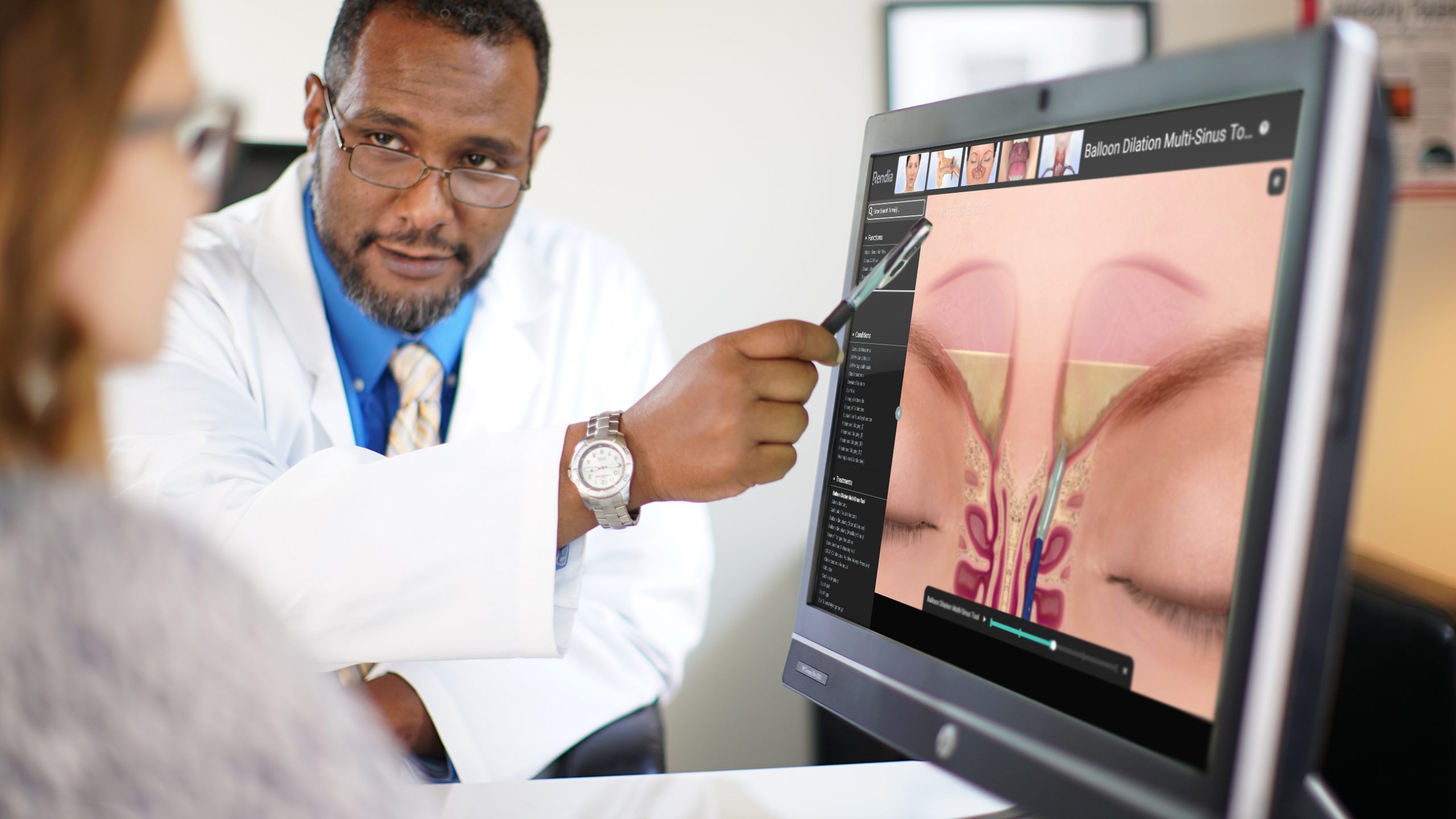 doctor and patient reviewing Exam Mode