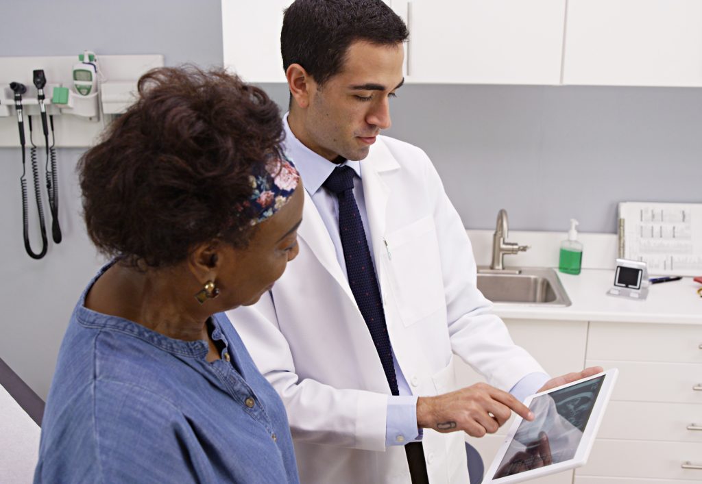 Doctor preparing patient for surgery