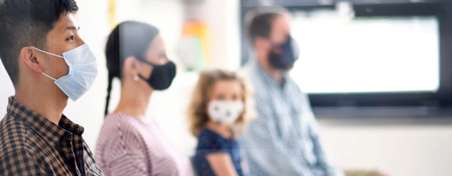 masked patients in waiting room